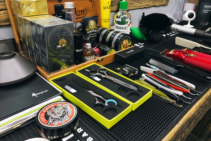 Мужская стрижка в барбершопе Garage на Октябрьской